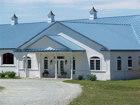 houses with dark blue metal roofs|blue corrugated roofing.